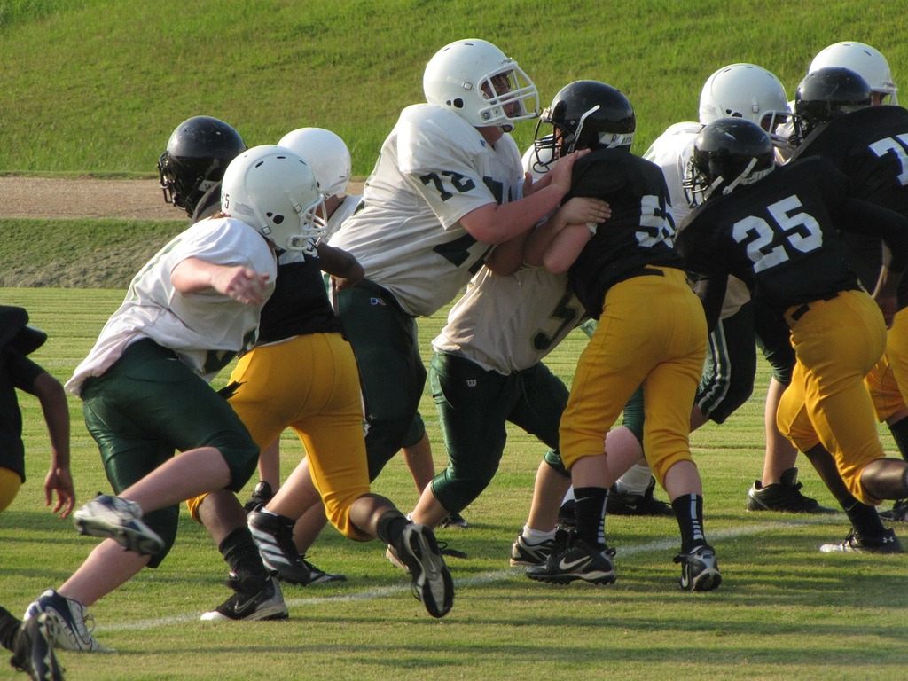 young-football-players-tackling