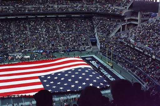 American-flag-across-field-in-stadium