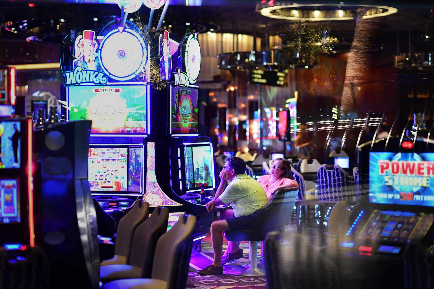 lit-up-slot-machines-in-casino