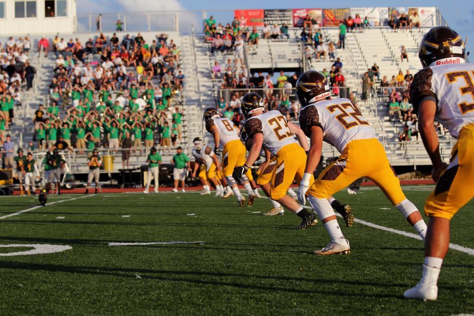 football-players-engaged-in-game-on-field