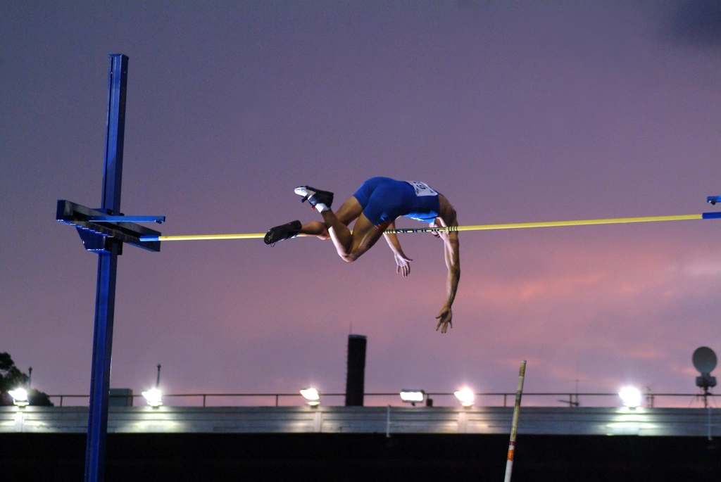 competitive-high-jumper-reaching-over-beam