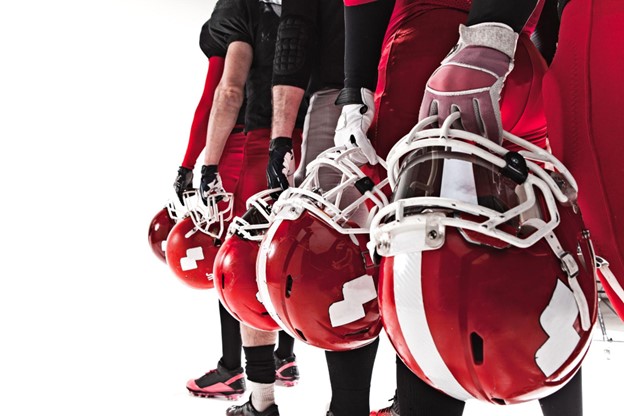 NFL Team Player Line With Focus on Helmets