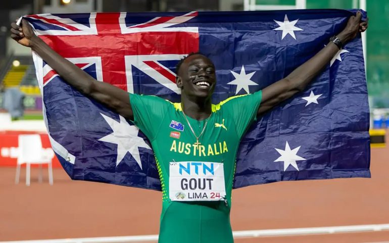 Australian-sprinter-holding-flag