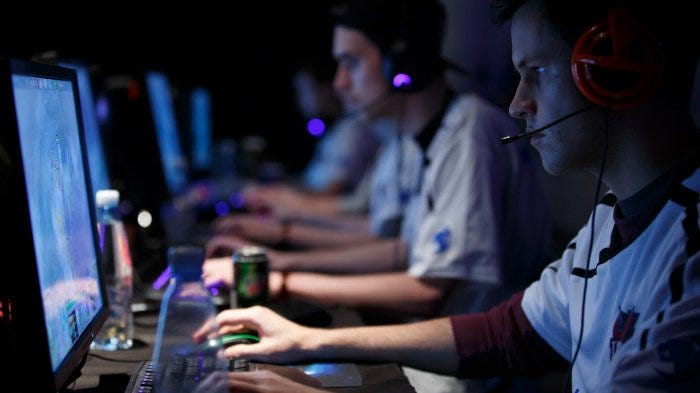 people-gambling-at-desktops