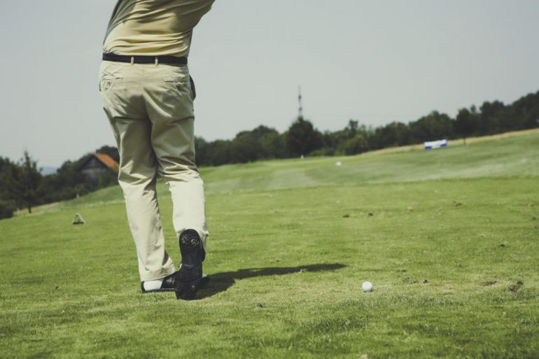 man-playing-golf-in-fairway