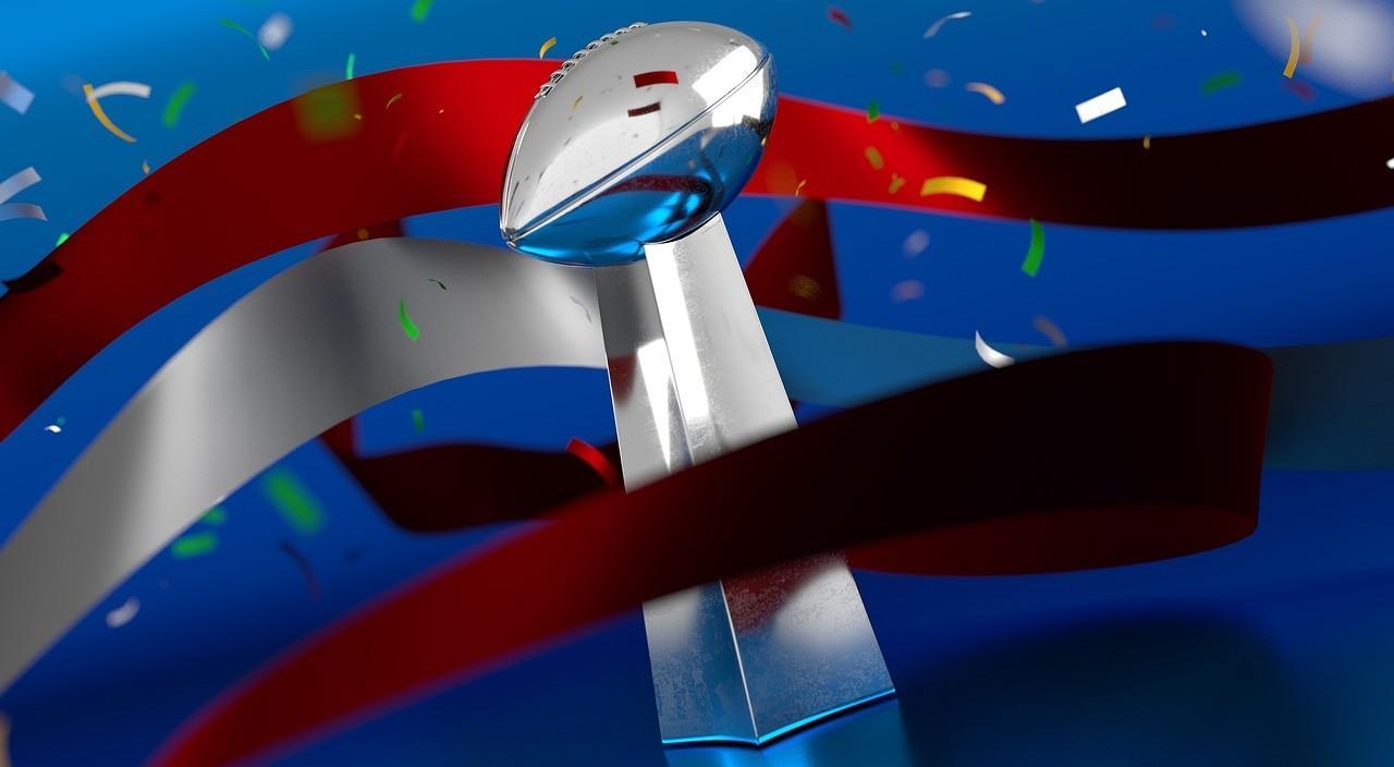 superbowl-trophy-with-riboons-around-it