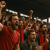 fans-in-stands-cheering-intently