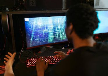 man-playing-video-games-on-computer