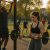 woman-lifting-bar-bell-at-the-park