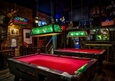 decorated-bar-with-pool-table-in-the-middle