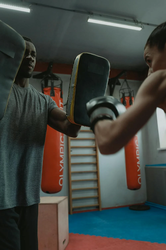 sports-guy-punching-bag