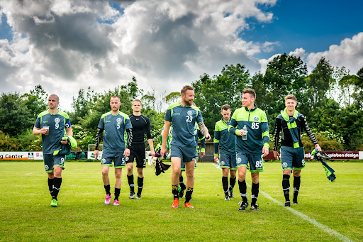 group-of-soccer-players-walking-in-group